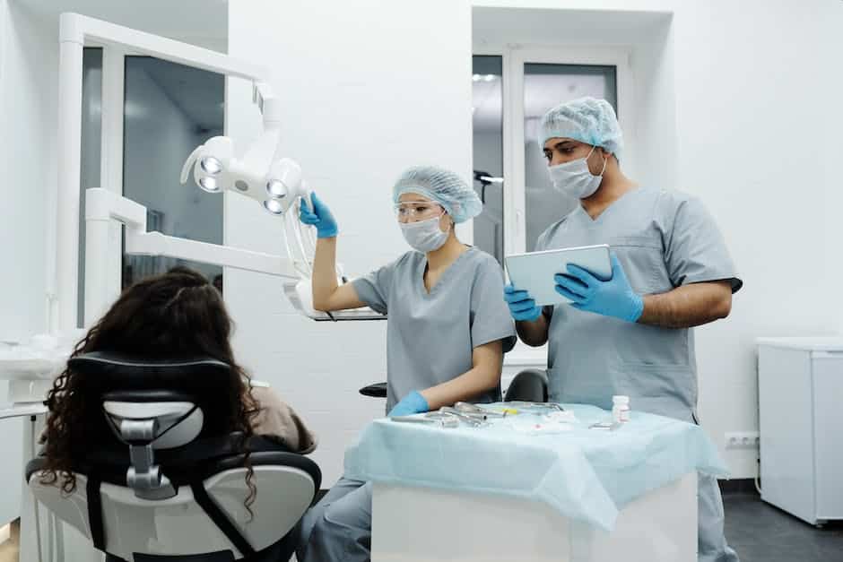 An image showing a dentist using the Itero system to scan a patient's teeth.